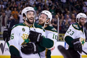Caption: Dallas Stars teammates celebrate a win following Game 7 of the AHL Western Conference Semifinals on June 3, 2014 at Cedar Park Center, TX