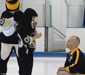 Penguins fan and local cop Gino on bended knee.